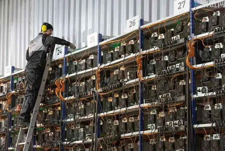 A modern mining farm with rows of Bitcoin mining machines humming efficiently.